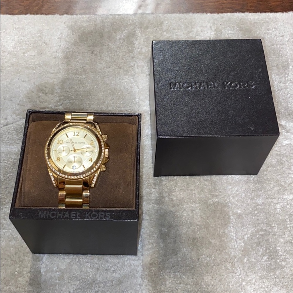 Gold Michael Kors watch with crystal detailing